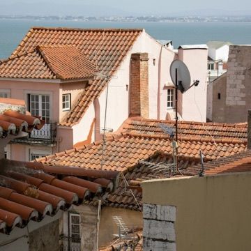 The tiled roofs of Lisbon above the Tagus